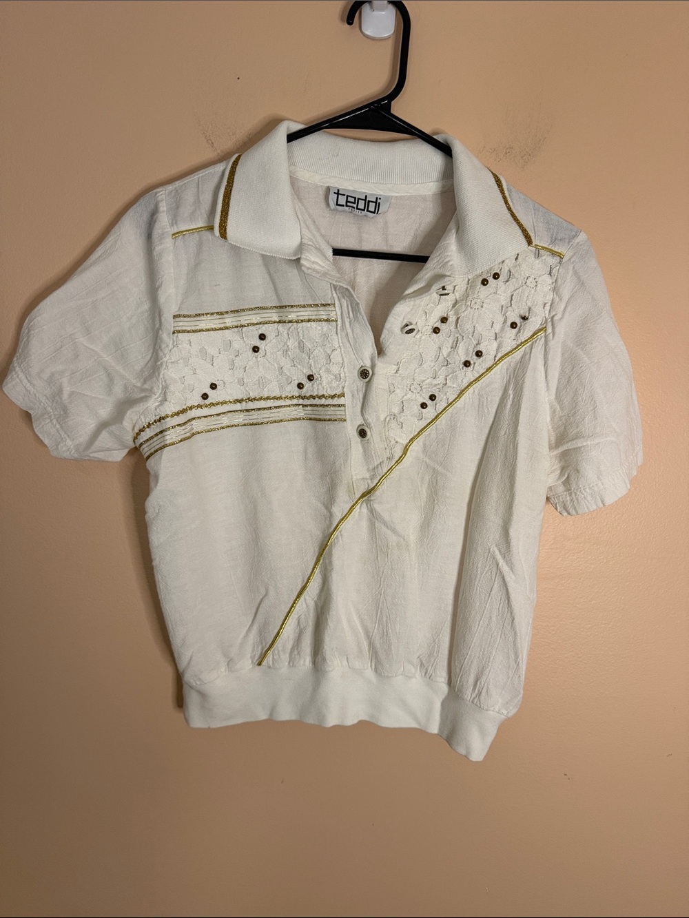 Teddi White Polo with Gold Trim and Embroidered Accents